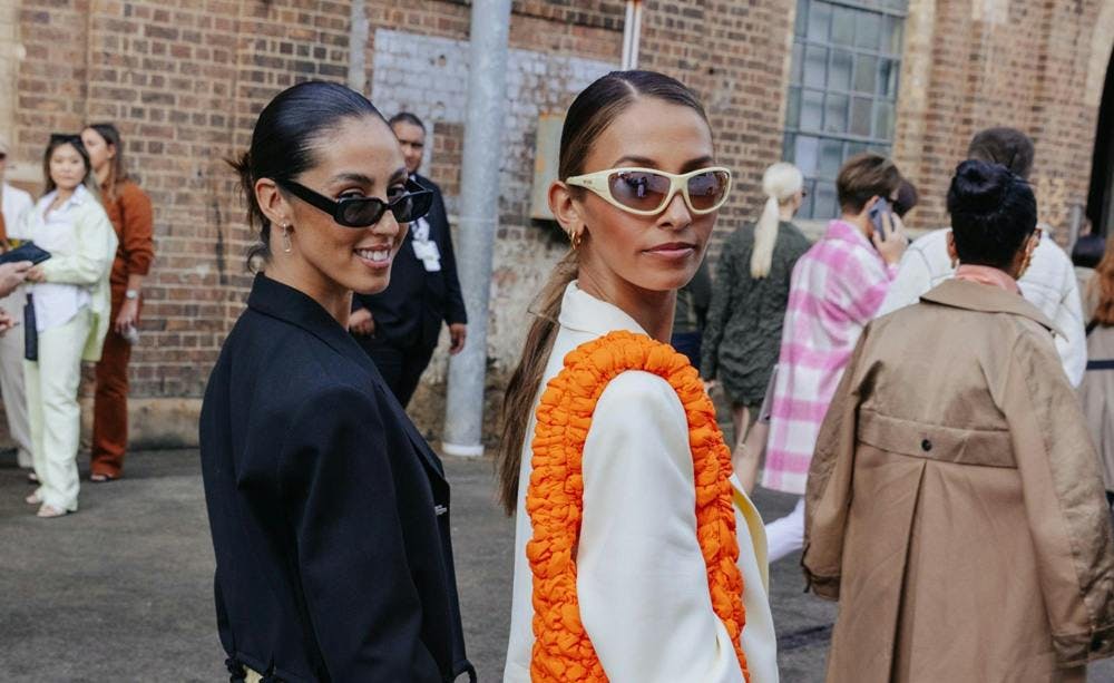 Women at Australian Fashion Week wearing sunglasses