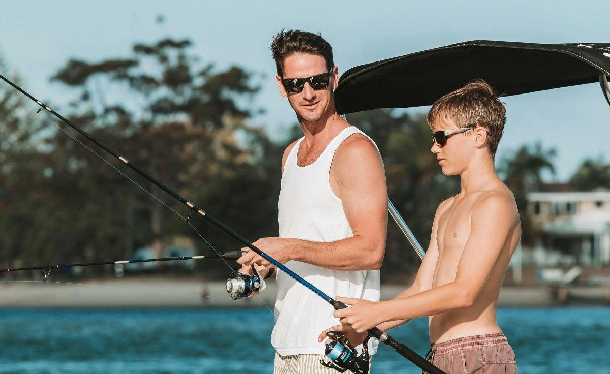 Fishing wearing sunglasses