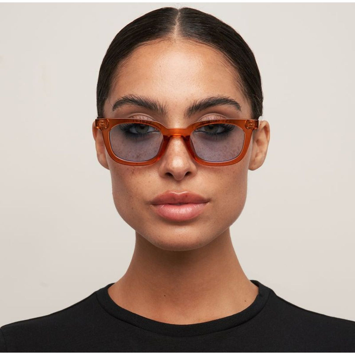 Nia, Transparent Tan/Light Blue Lenses